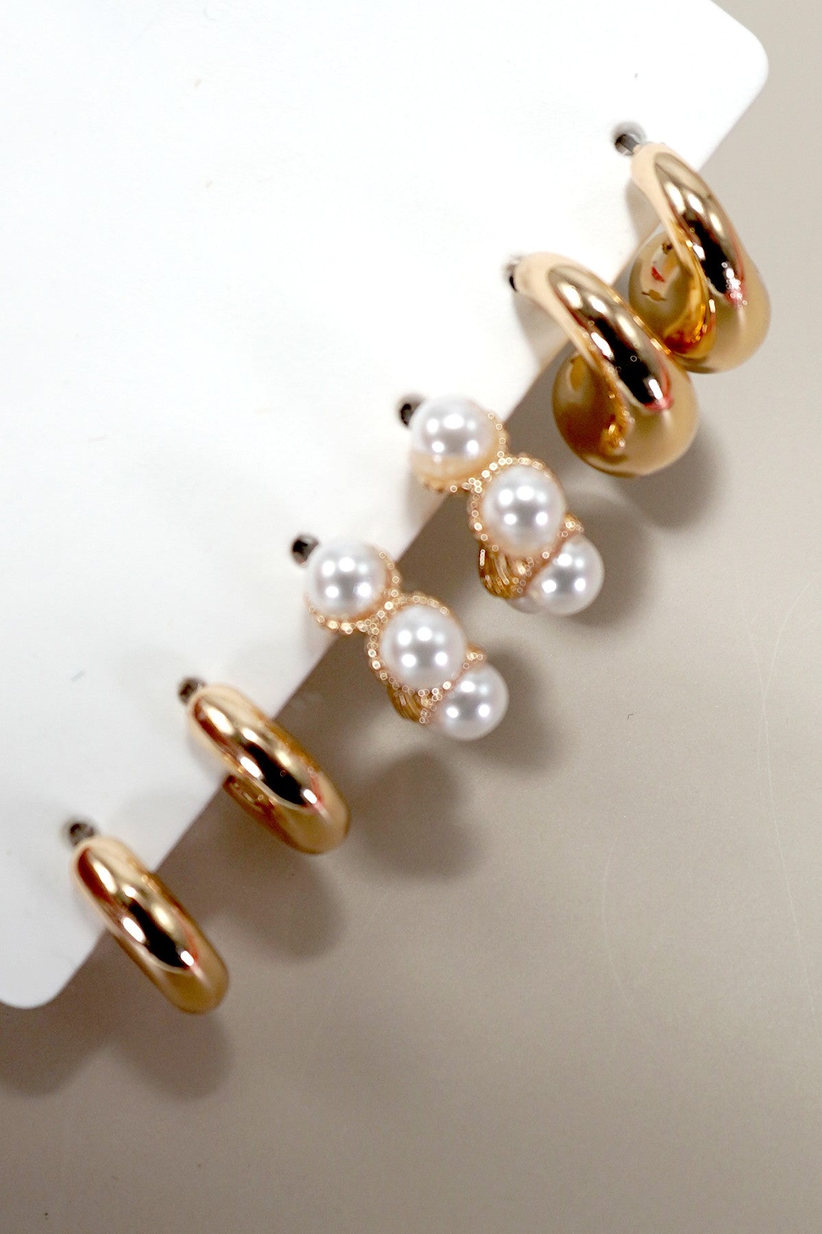 Trio Huggie Pearl Gold Hoop Earrings